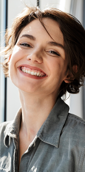 Smiling woman with short brown hair